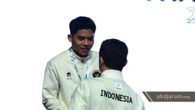Moh Zaki Ubaidillah & Taufik Hidayat